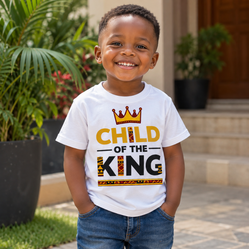 Nigerian child wearing a white Child of the King Christian kids shirt with crown design