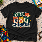 Abụ M Nwa Chineke Igbo Christian kids shirt in black featuring colourful block lettering and decorative accents
