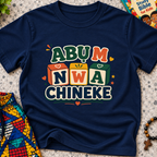 Abụ M Nwa Chineke Igbo Christian kids shirt in navy blue featuring colourful block lettering and decorative accents
