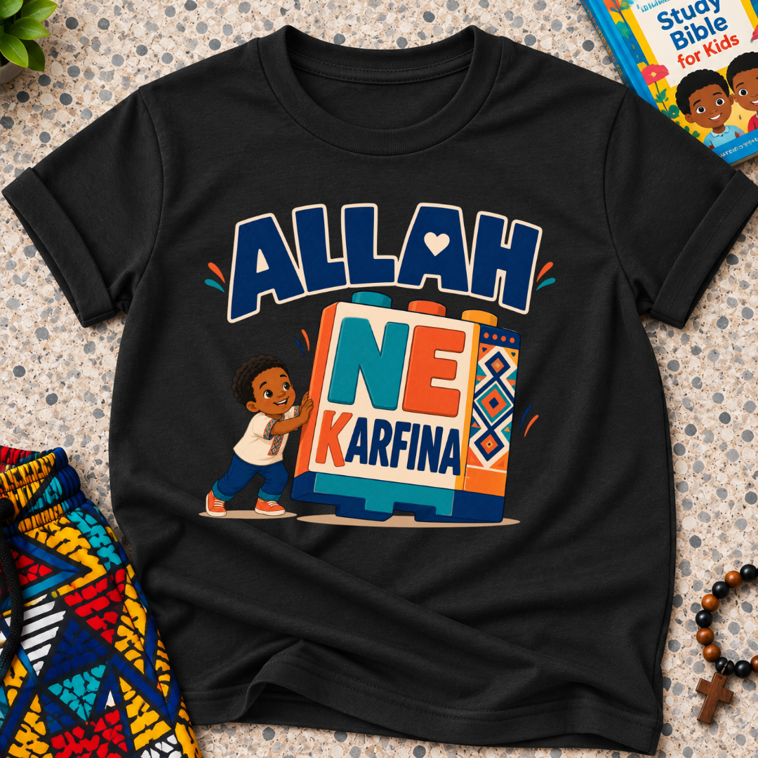 Allah Ne Ƙarfina Hausa-language kids shirt in navy blue featuring bold lettering and a child beside colourful blocks
