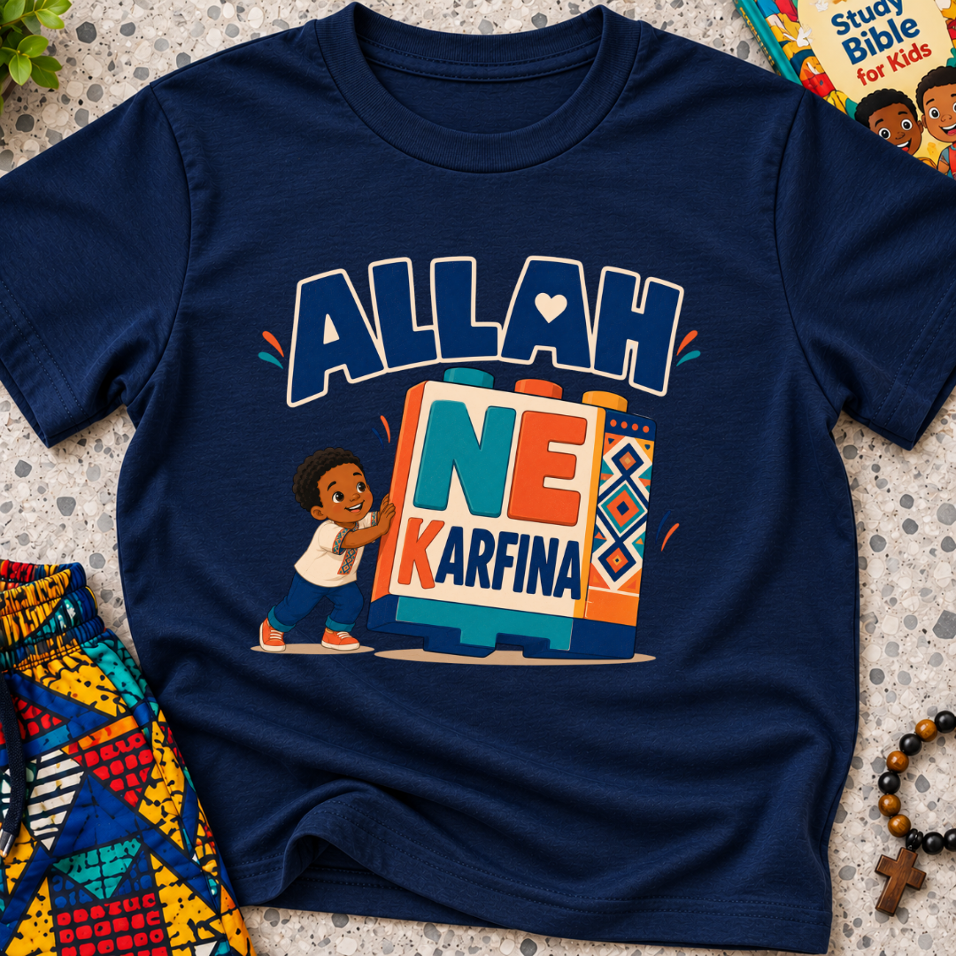 Allah Ne Ƙarfina Hausa-language kids shirt in navy blue featuring bold lettering and a child beside colourful blocks
