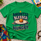 Anointed Blessed Still Hungry Christian kids shirt in green featuring bold lettering and food-inspired artwork
