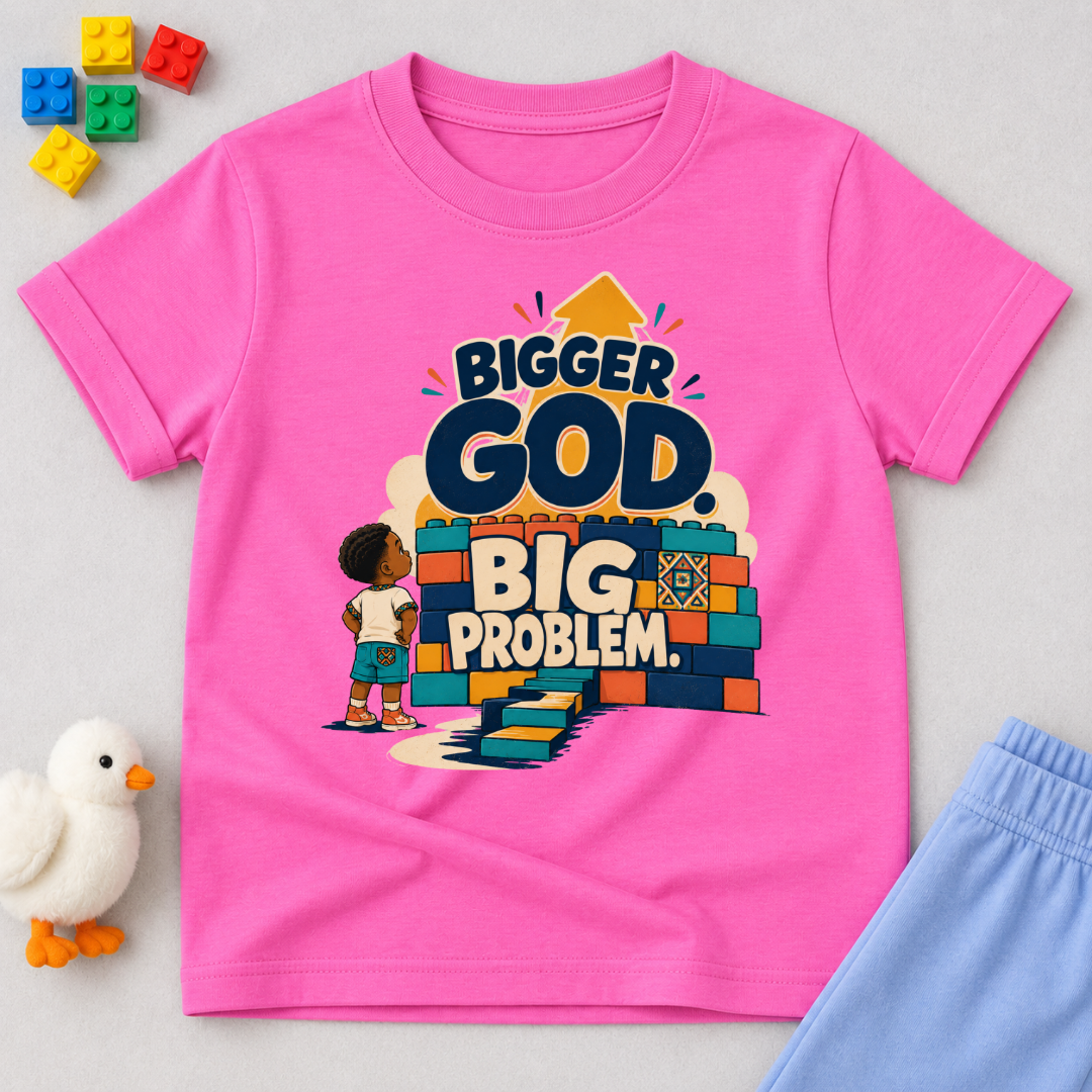 Bigger God, Big Problem Christian kids shirt in pink featuring children, colourful blocks, and a faith message
