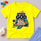 Bigger God, Big Problem Christian kids shirt in yellow featuring children, colourful blocks, and a faith message
