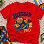 Blessed Loved and Well Fed Christian kids shirt in red featuring colourful food and family-inspired artwork
