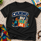 Chukwu Bụ Ike M Igbo Christian kids shirt in black featuring bold lettering and a child beside colourful blocks
