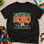 Chukwu Huru M N'anya Igbo Christian kids shirt in black featuring bold colourful lettering and decorative artwork
