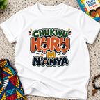 Chukwu Huru M N'anya Igbo Christian kids shirt in white featuring bold colourful lettering and decorative artwork
