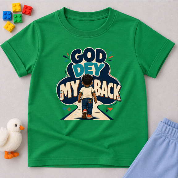 God Dey My Back Christian kids shirt in green featuring a child illustration and bold Nigerian Pidgin faith message
