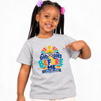 God Goes Before Me Christian kids shirt in light grey featuring a colourful road, sunrise, and faith message
