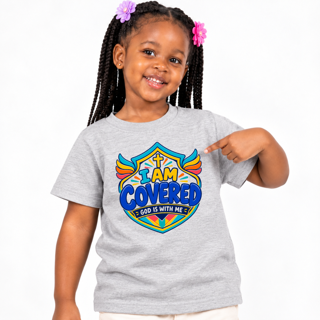 I Am Covered Christian kids shirt in light grey featuring a shield design, cross, and God Is With Me message
