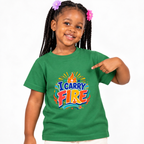 I Carry Fire Christian kids shirt in green featuring bold lettering, flames, and a faith-inspired cross
