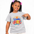 I Carry Fire Christian kids shirt in light grey featuring bold lettering, flames, and a faith-inspired cross
