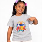 I Carry Fire Christian kids shirt in light grey featuring bold lettering, flames, and a faith-inspired cross
