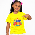 I Carry Fire Christian kids shirt in yellow featuring bold lettering, flames, and a faith-inspired cross
