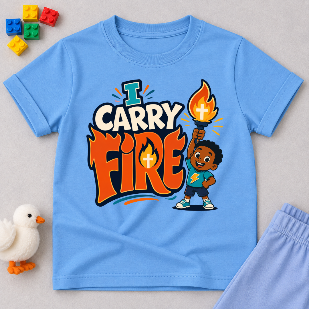 I Carry Fire Christian kids shirt in light blue featuring an illustrated child holding a flaming torch
