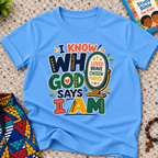 I Know Who God Says I Am Christian kids shirt in light blue featuring colourful lettering and faith-based identity words
