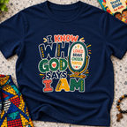 I Know Who God Says I Am Christian kids shirt in navy blue featuring colourful lettering and faith-based identity words
