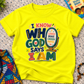 I Know Who God Says I Am Christian kids shirt in yellow featuring colourful lettering and faith-based identity words
