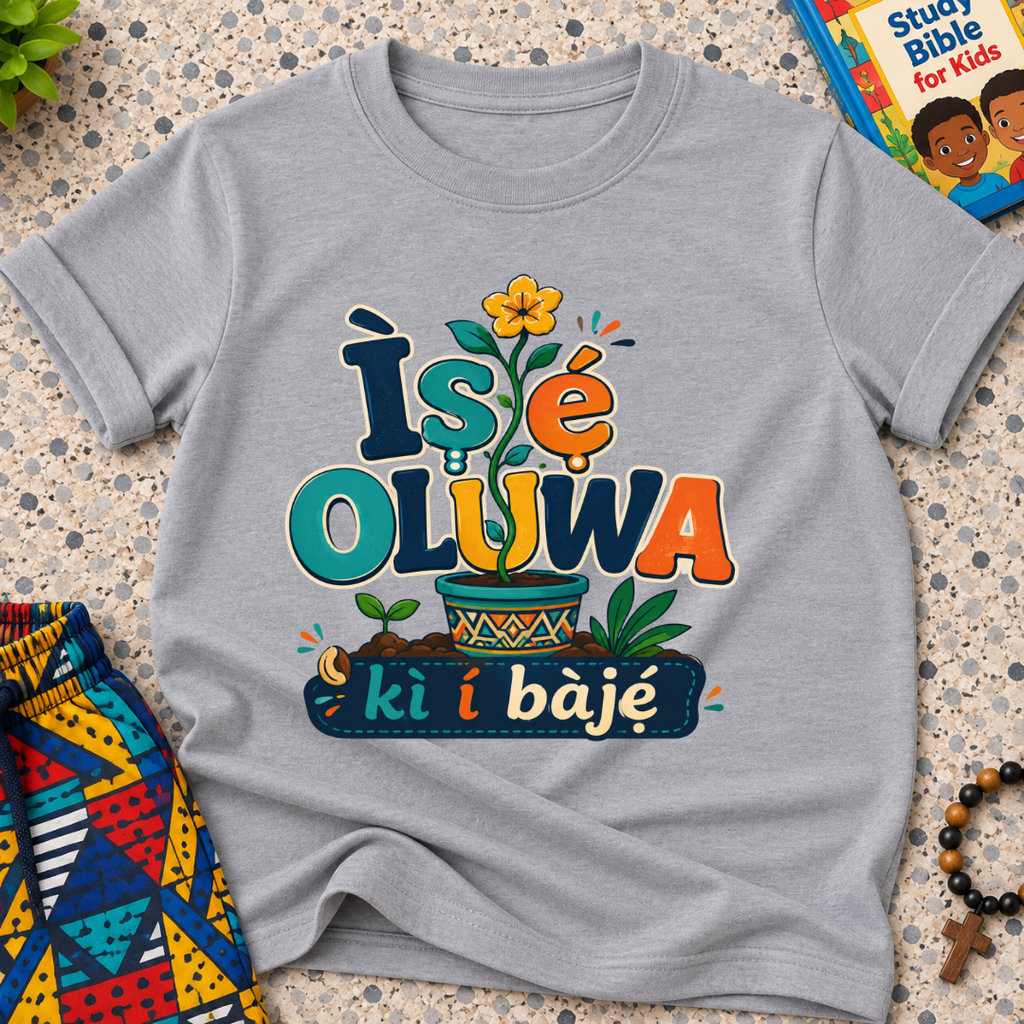 Ìṣẹ́ Olúwa Kì Í Bàjẹ́ Yoruba Christian kids shirt in grey featuring colourful lettering and Nigerian-inspired decorative artwork
