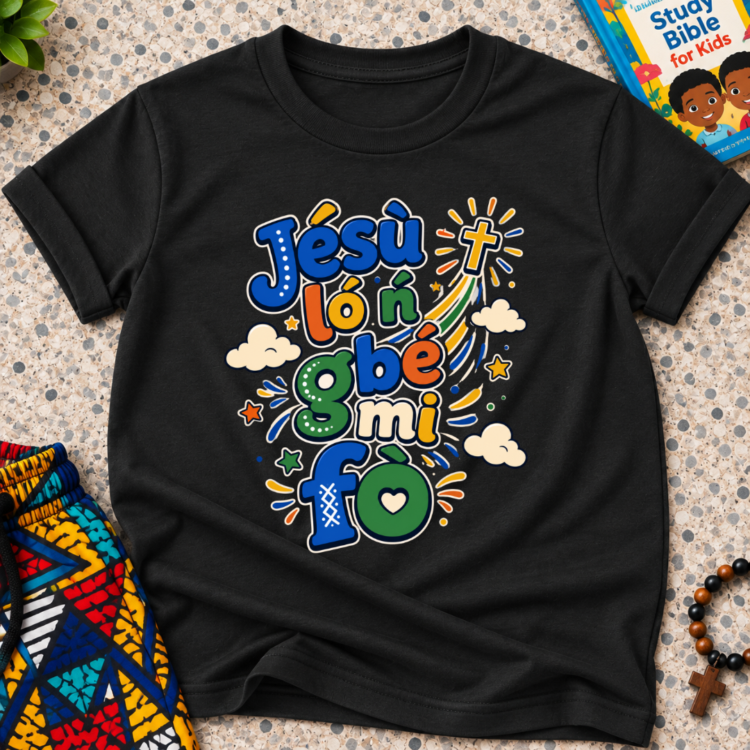Jésù Lọ́n Gbẹ Mi Fọ Yoruba Christian kids shirt in black featuring colourful lettering, clouds, and star illustrations
