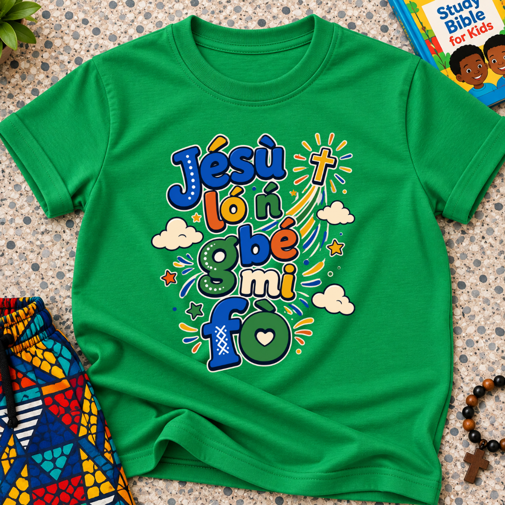 Jésù Lọ́n Gbẹ Mi Fọ Yoruba Christian kids shirt in green featuring colourful lettering, clouds, and star illustrations
