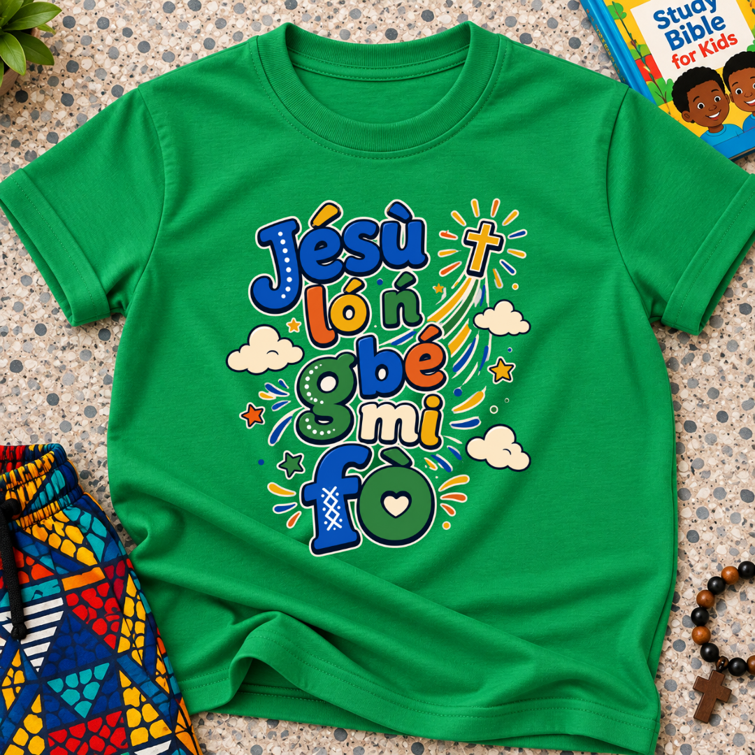 Jésù Lọ́n Gbẹ Mi Fọ Yoruba Christian kids shirt in green featuring colourful lettering, clouds, and star illustrations
