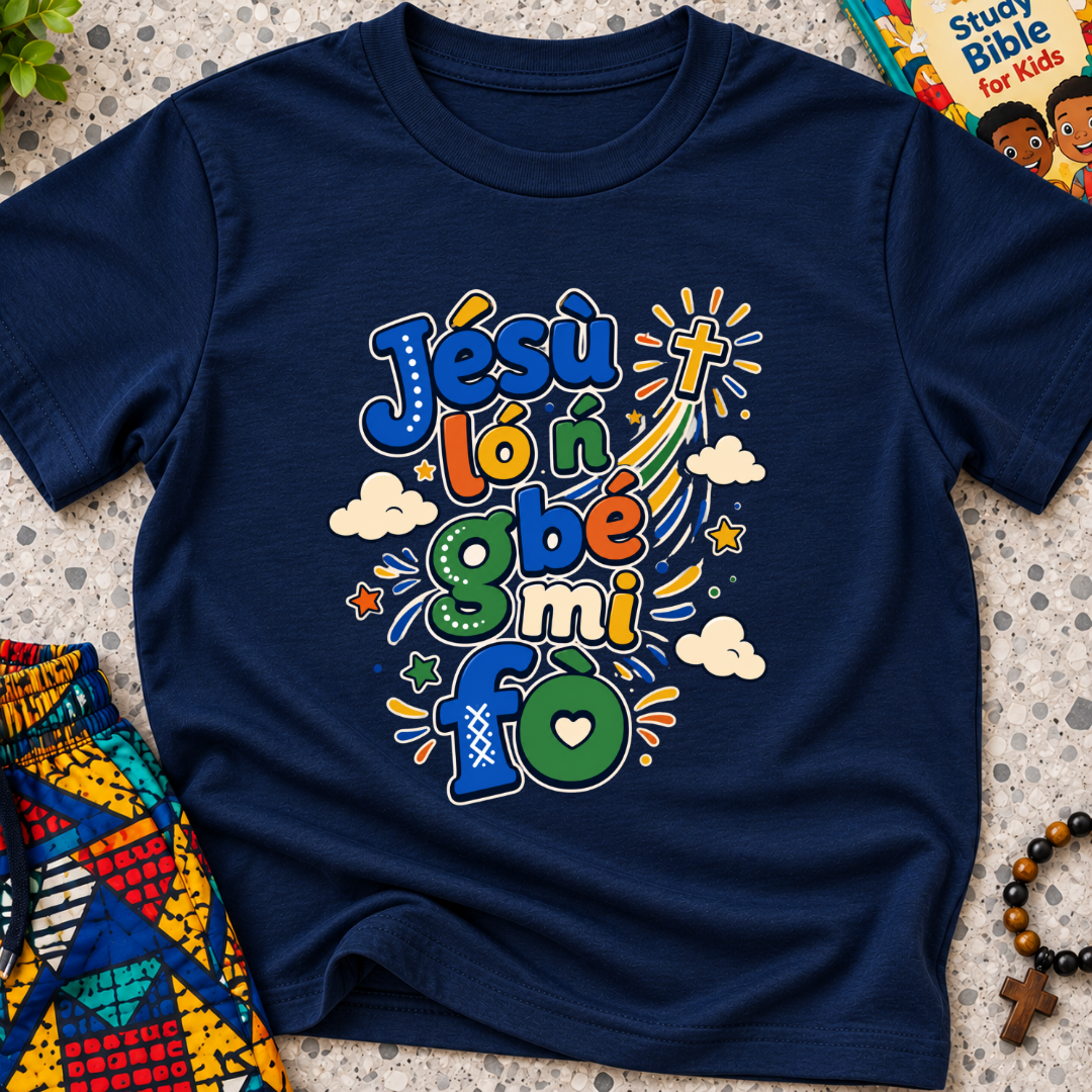 Jésù Lọ́n Gbẹ Mi Fọ Yoruba Christian kids shirt in navy blue featuring colourful lettering, clouds, and star illustrations
