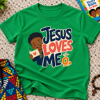 Jesus Loves Me Christian kids shirt in green featuring an illustrated child holding a heart
