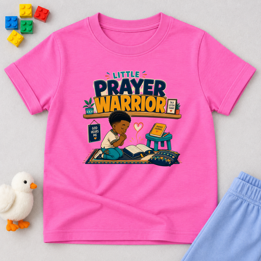 Little Prayer Warrior Christian kids shirt in pink featuring a child praying with colourful faith-inspired artwork
