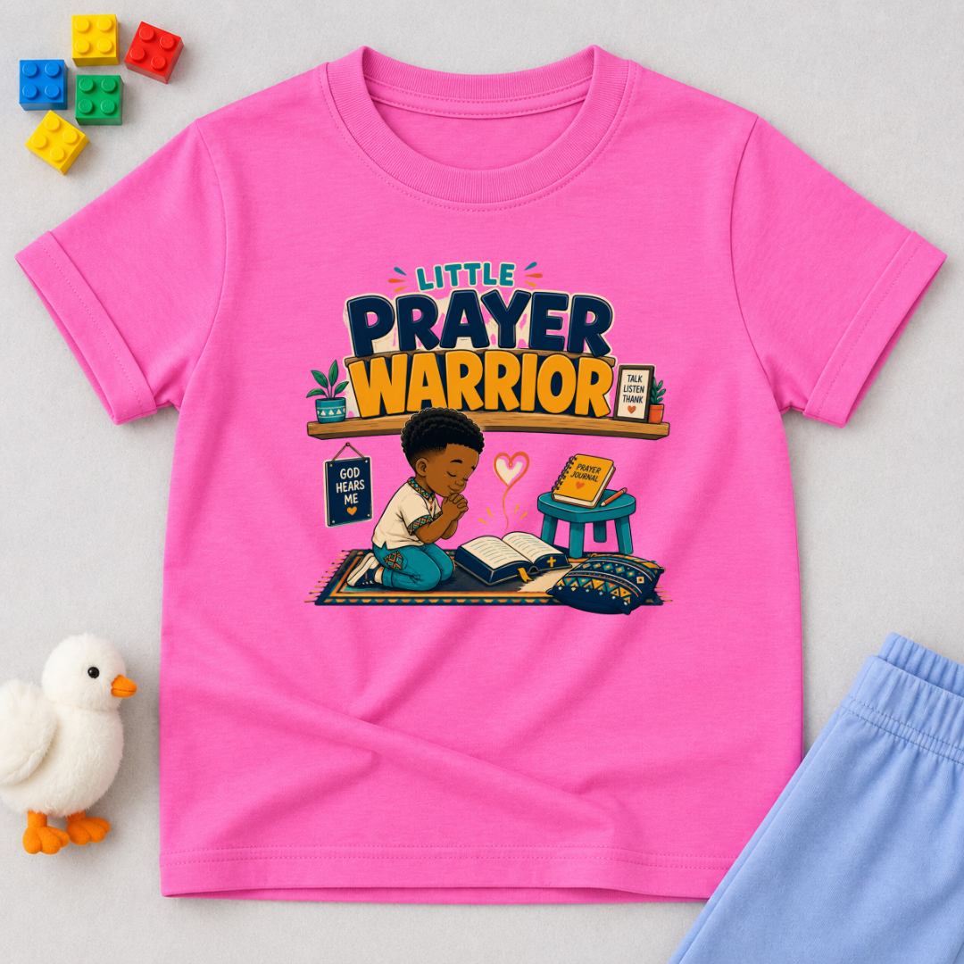 Little Prayer Warrior Christian kids shirt in pink featuring a child praying with colourful faith-inspired artwork
