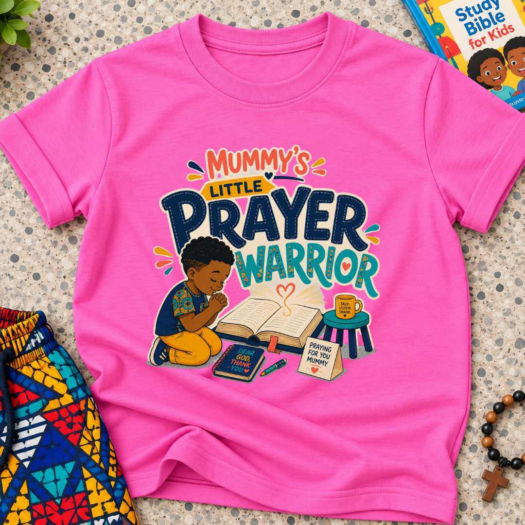 Mummy's Little Prayer Warrior Christian kids shirt in pink featuring a child praying beside books and faith-inspired details
