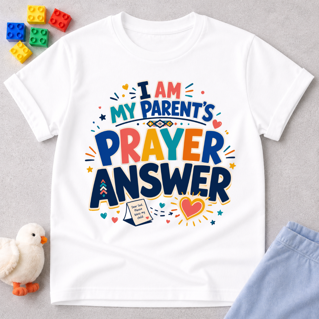 My Parent's Prayer Answer Christian kids shirt in white featuring colourful lettering, hearts, and prayer-themed artwork

