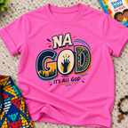 Na God It's All God Christian kids shirt in pink featuring bold Nigerian-inspired typography and faith artwork

