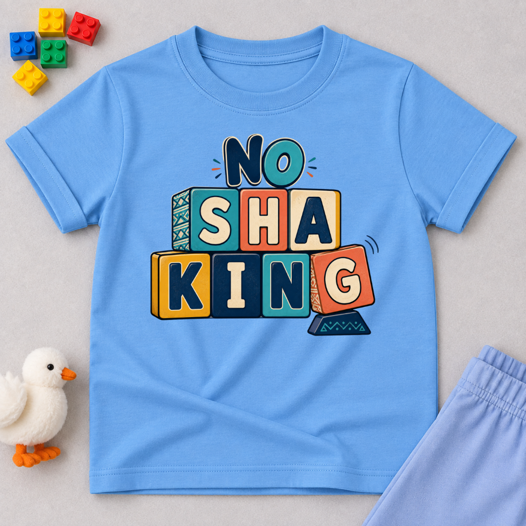 No Shaking Christian kids shirt in light blue featuring bold colourful block lettering and a Nigerian Pidgin message
