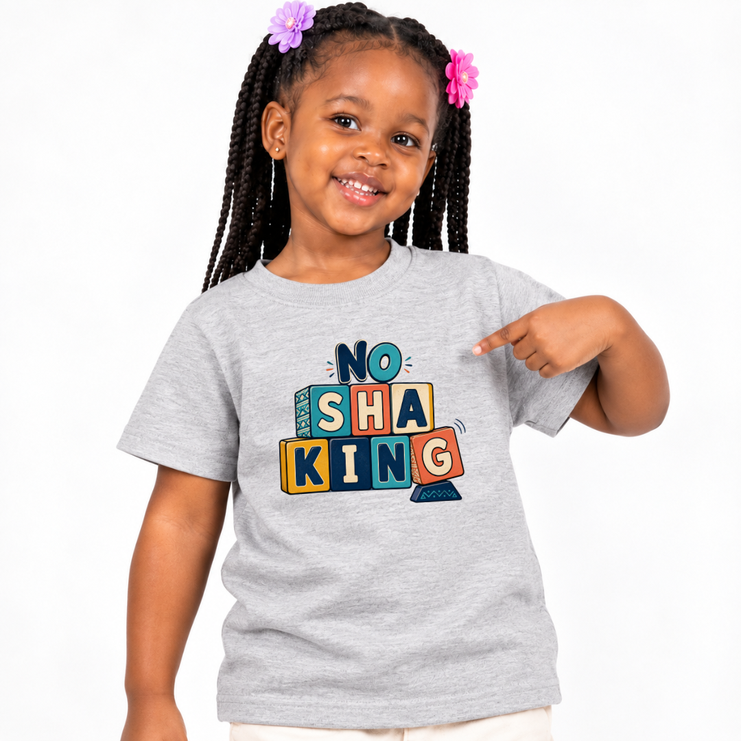 No Shaking Christian kids shirt in light grey featuring bold colourful block lettering and a Nigerian Pidgin message
