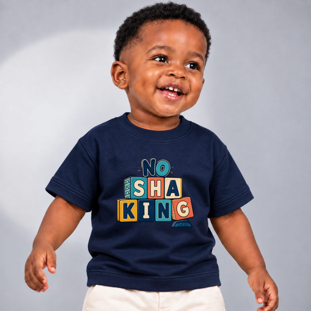 No Shaking Christian kids shirt in navy blue featuring bold colourful block lettering and a Nigerian Pidgin message
