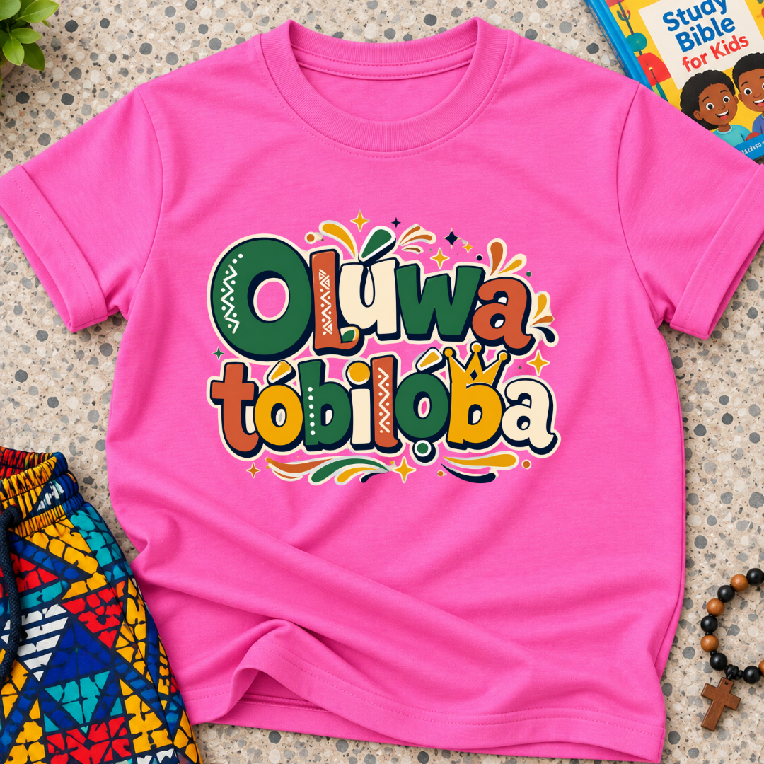 Oluwatobiloba Yoruba-inspired kids shirt in pink featuring colourful oversized lettering and playful decorative artwork