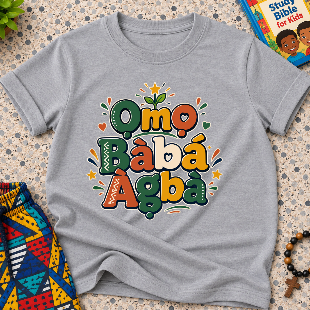 Ọmọ Bàbá Àgbà Yoruba-language kids shirt in grey featuring colourful lettering, decorative leaves, and playful accents