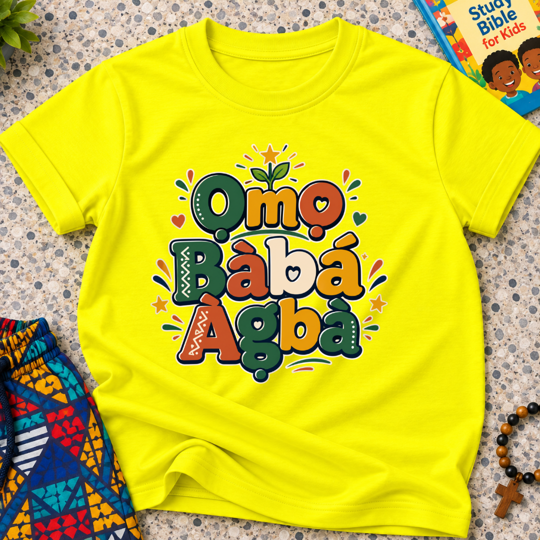 Ọmọ Bàbá Àgbà Yoruba-language kids shirt in yellow featuring colourful lettering, decorative leaves, and playful accents