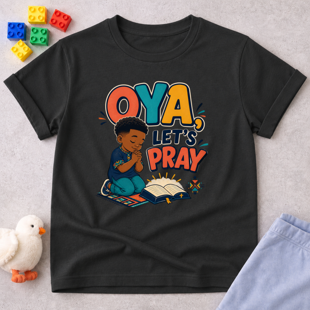 Oya, Let's Pray Christian kids shirt in black featuring a child praying and a colourful Nigerian Pidgin-inspired message
