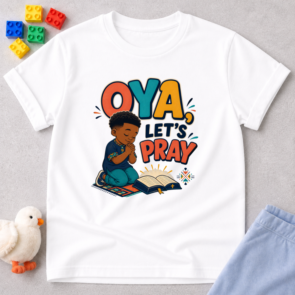 Oya, Let's Pray Christian kids shirt in white featuring a child praying and a colourful Nigerian Pidgin-inspired message
