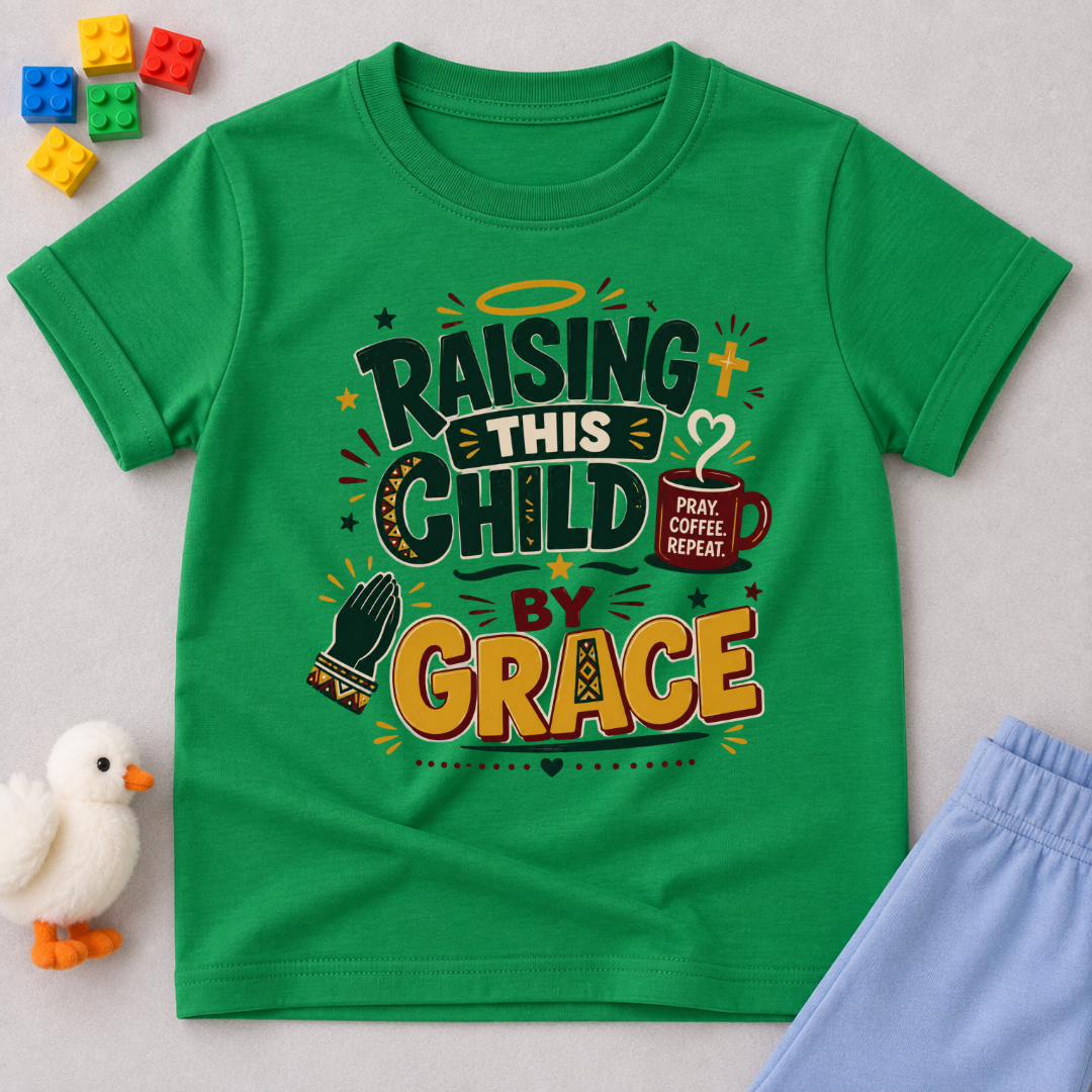 Raising This Child by Grace Christian kids shirt in green featuring warm typography and playful parenting-themed artwork
