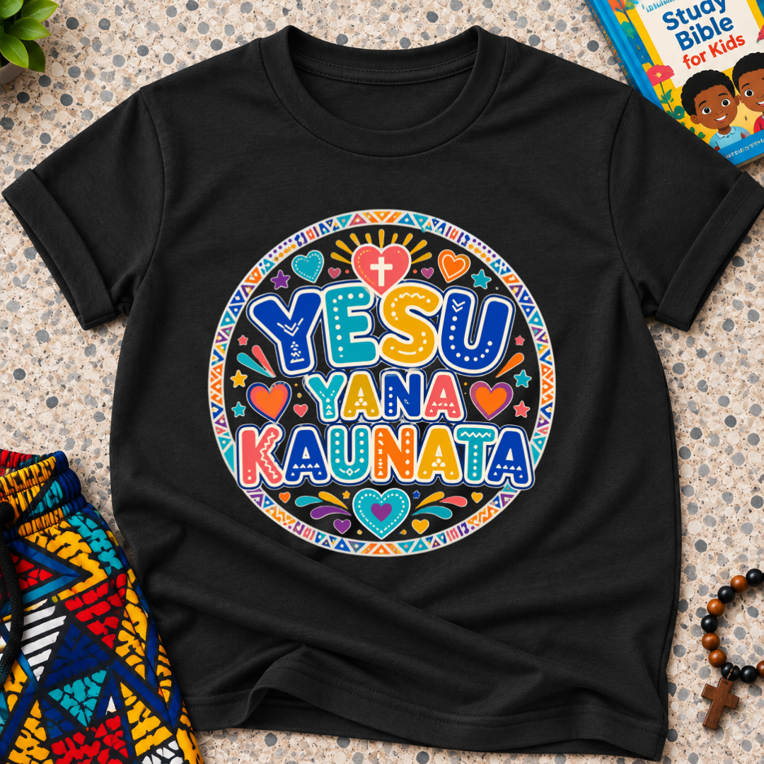 Yesu Yana Ƙaunata Hausa-language kids shirting in black featuring an alternative colourful lettering design
