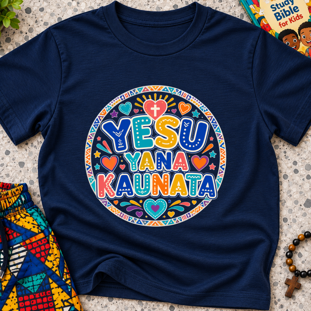 Yesu Yana Ƙaunata Hausa-language kids shirting in navy blue featuring an alternative colourful lettering design
