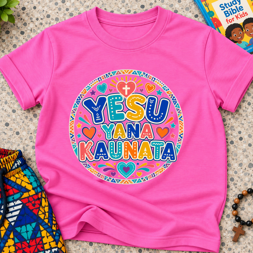 Yesu Yana Ƙaunata Hausa-language kids shirting in pink featuring an alternative colourful lettering design
